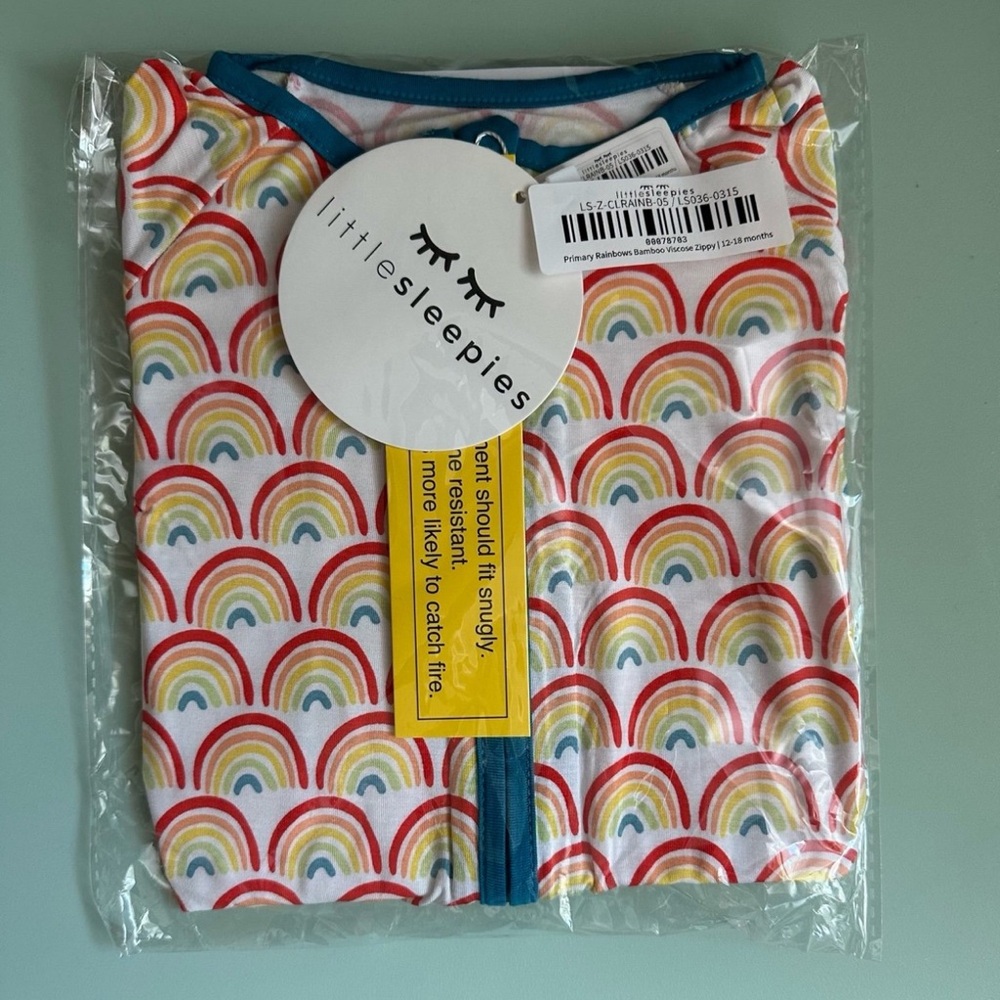 Little Sleepies primary rainbows zippy